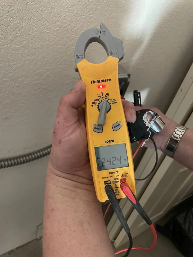 Voltage testing with clamp meter during Hot Tub / Pool Electrical Wiring in Aquia Harbour